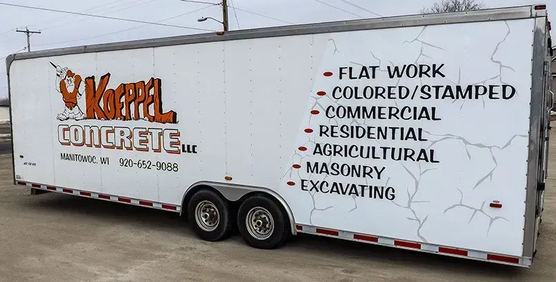 A white trailer with the word concrete on it