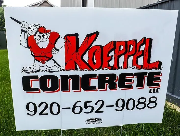 A sign that says koppel concrete on it