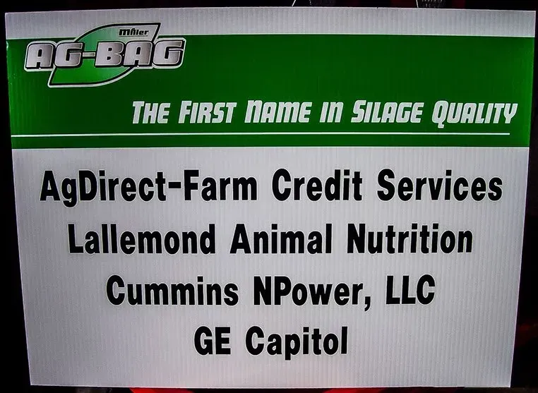 A sign that says ag direct farm credit services lallemond animal nutrition cummins npower llc ge capitol