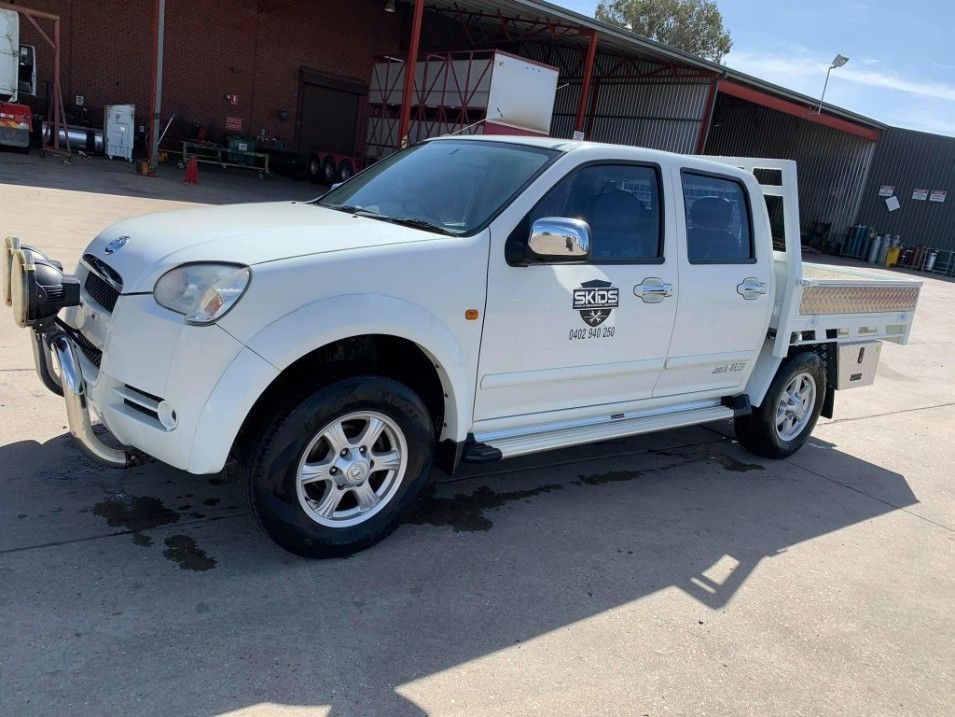 A White Truck is Parked in a Parking Lot — Skids Mechanical Services Pty Ltd in Wagga Wagga, NSW