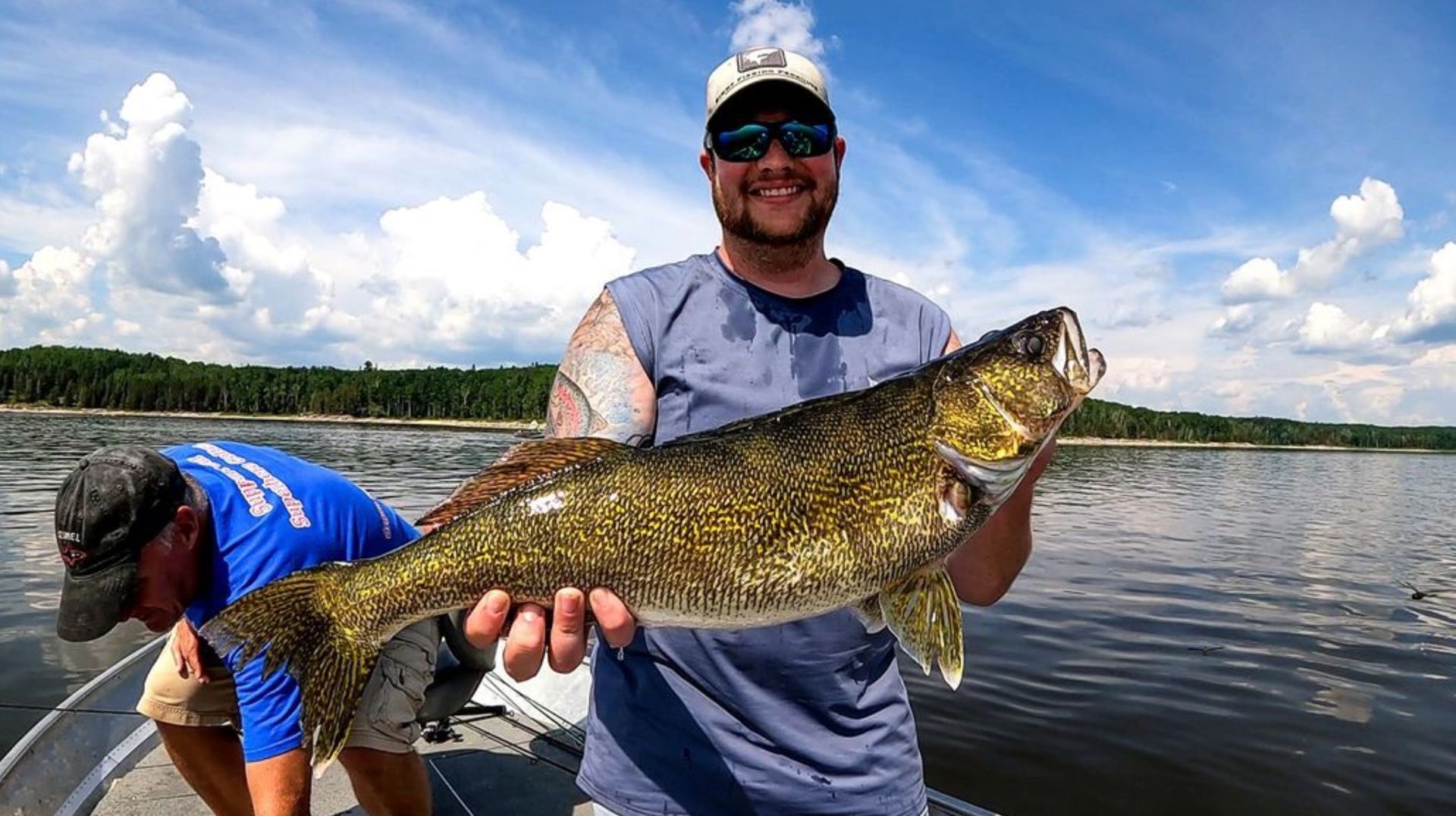Holding a 27 inch walleye at Oak Lake Lodge in the summer of 2023.