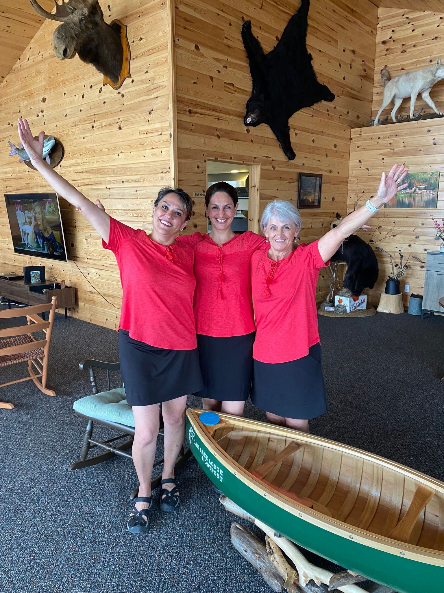 May, Sarah and Arlette standing in the main dining of the fly in fishing lodge in Canada called Oak Lake Lodge