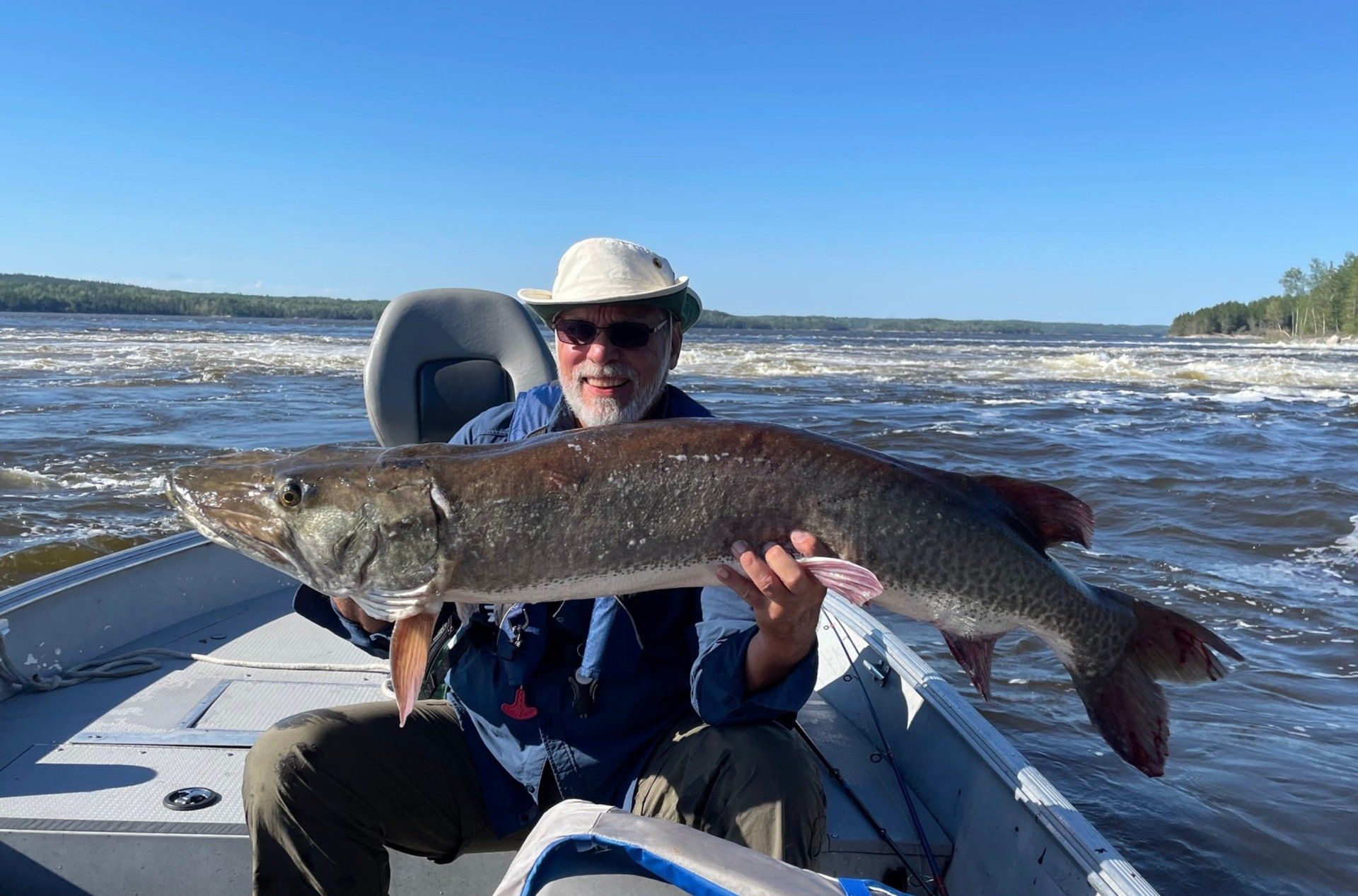 Frank with the muskie he caught at oak lake lodge.