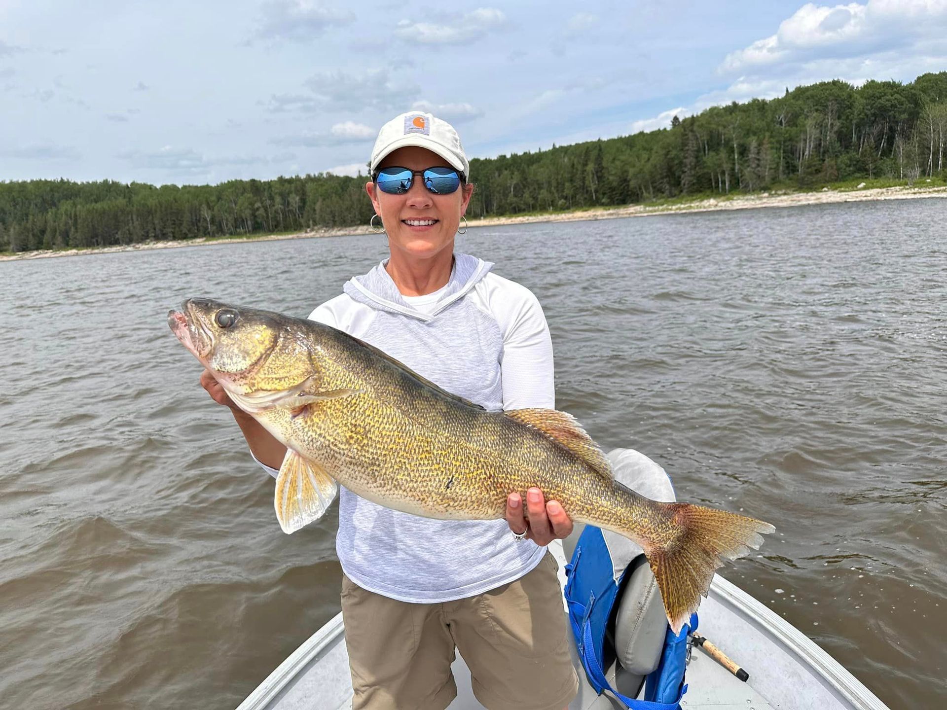 Michelle with her walleye from the summer of 2023.