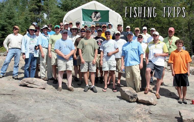 A group from University of North Dakota standing on the Canadian shield on the shores of Oak Lake.