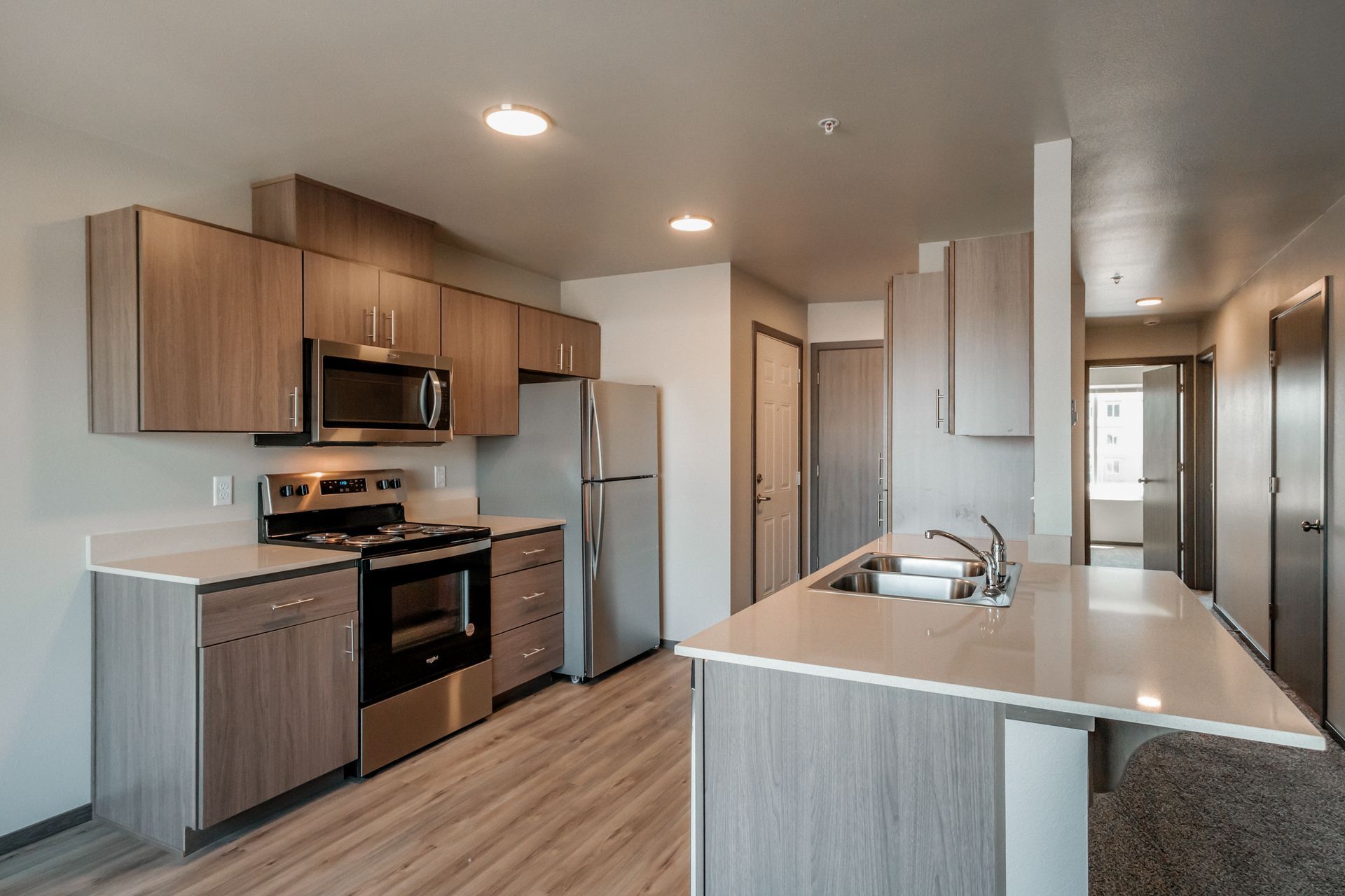 Birch Place Apartments in Salem Oregon, near Chemeketa Community College – kitchen, stove, microwave, kitchen sink.