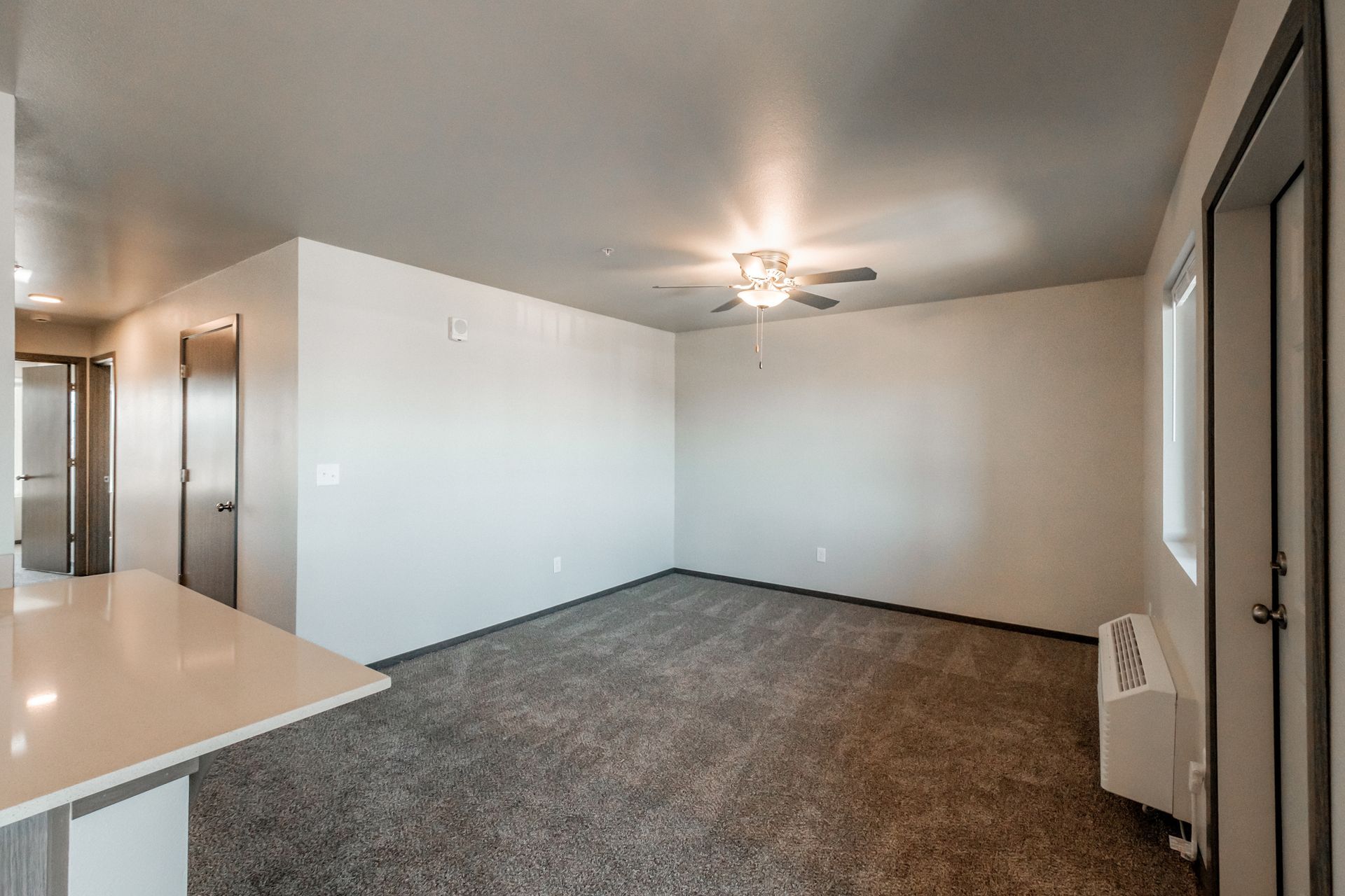 Birch Place Apartments in Salem Oregon, near Chemeketa Community College – Living room, heater and air conditioning.