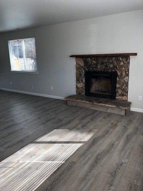 Prairie Place Duplexes in SE Albany OR, two-bedroom, one-bath – fireplace, living room window.