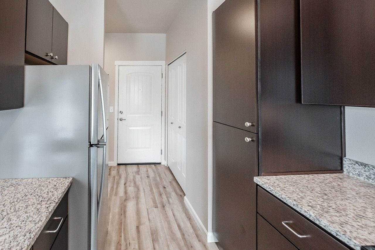 Hickory Hollow Apartments in North Albany OR, two-bedroom two-bathroom – kitchen, entryway. 