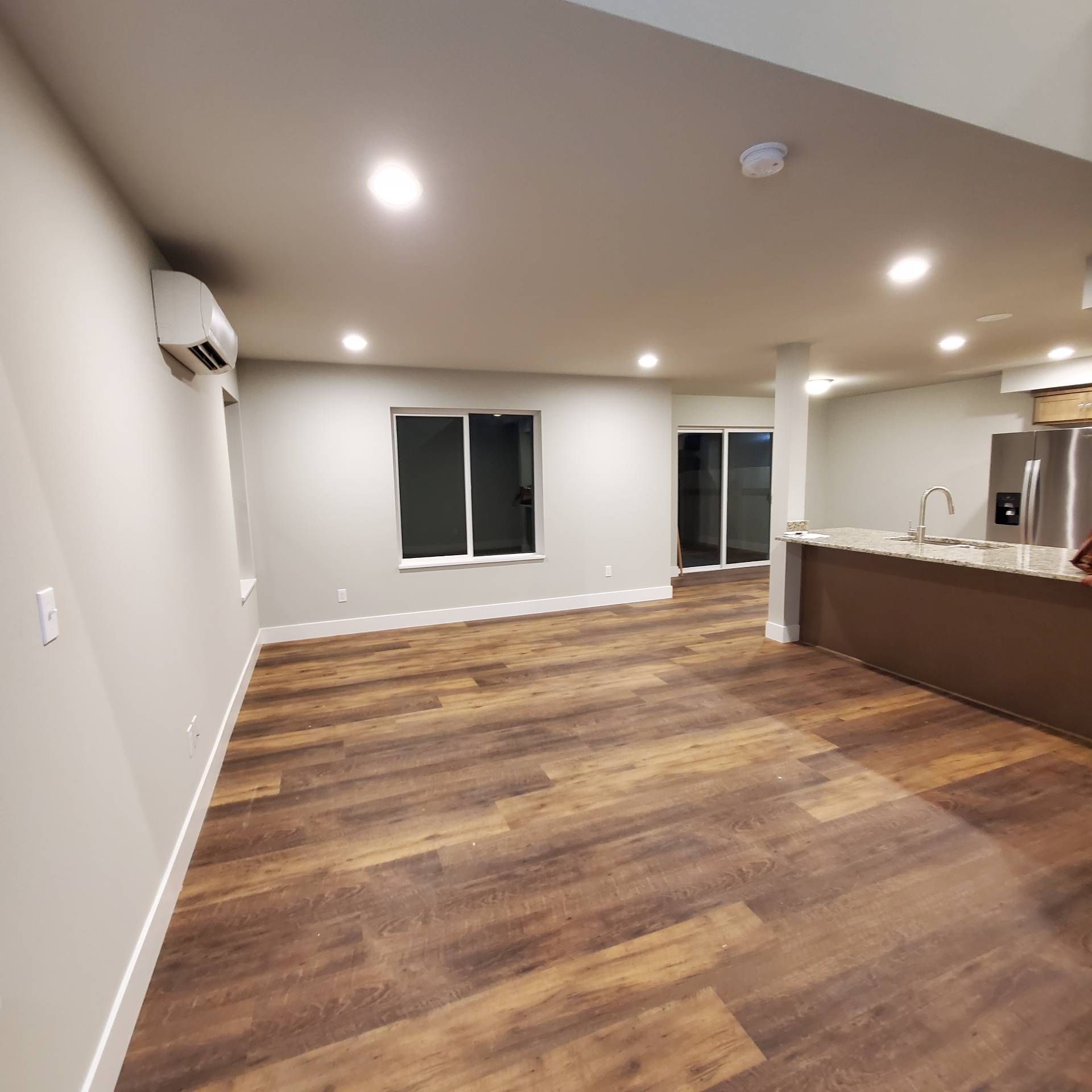 Rye Street Town Homes in Albany, OR. Two Bedroom, Two and 1/2 Bathroom – living room towards back window.