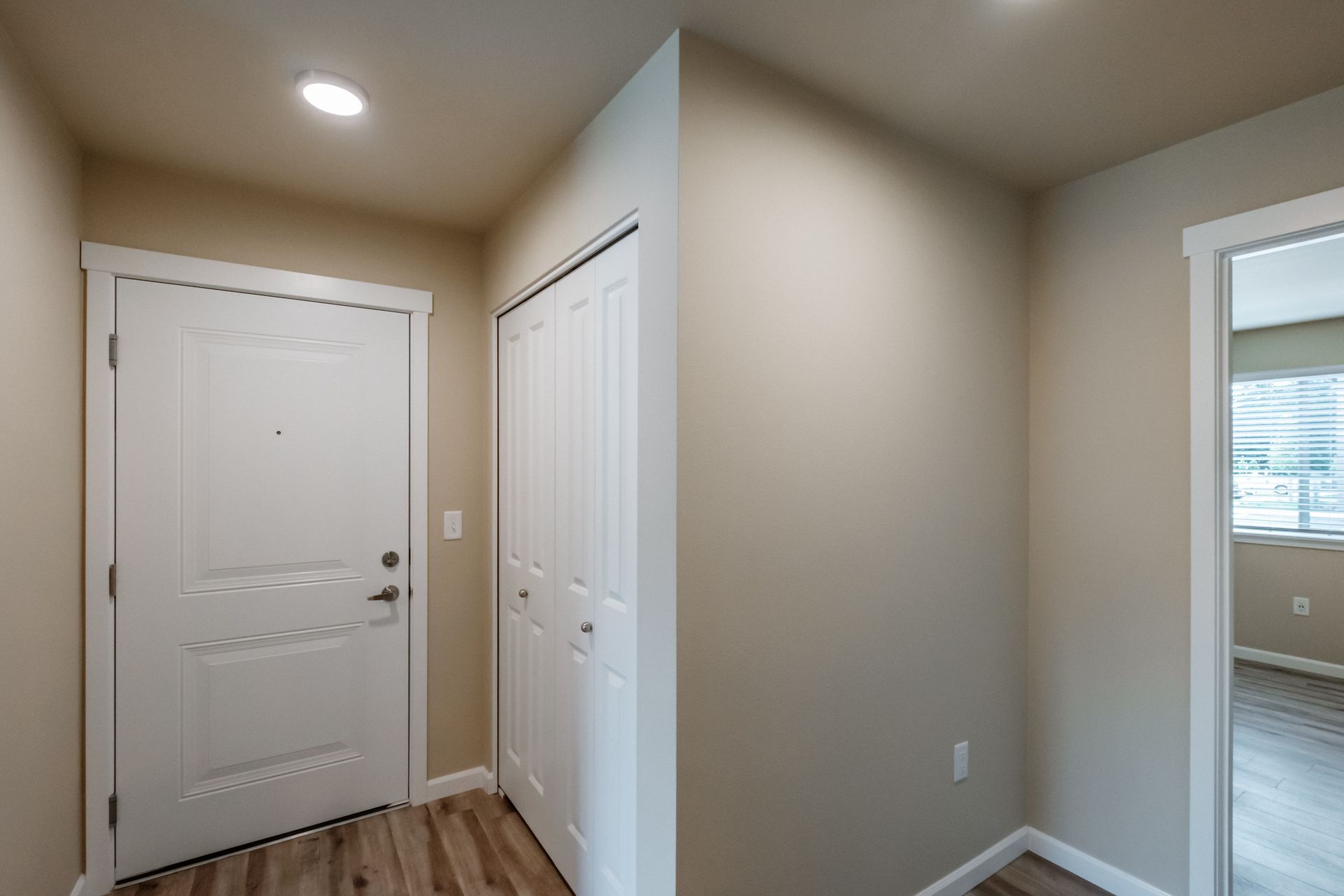 Santiam Gateway Apartments in Sweet Home Oregon, two-bedroom two-bathroom –bedroom doors in spacious hallway.
