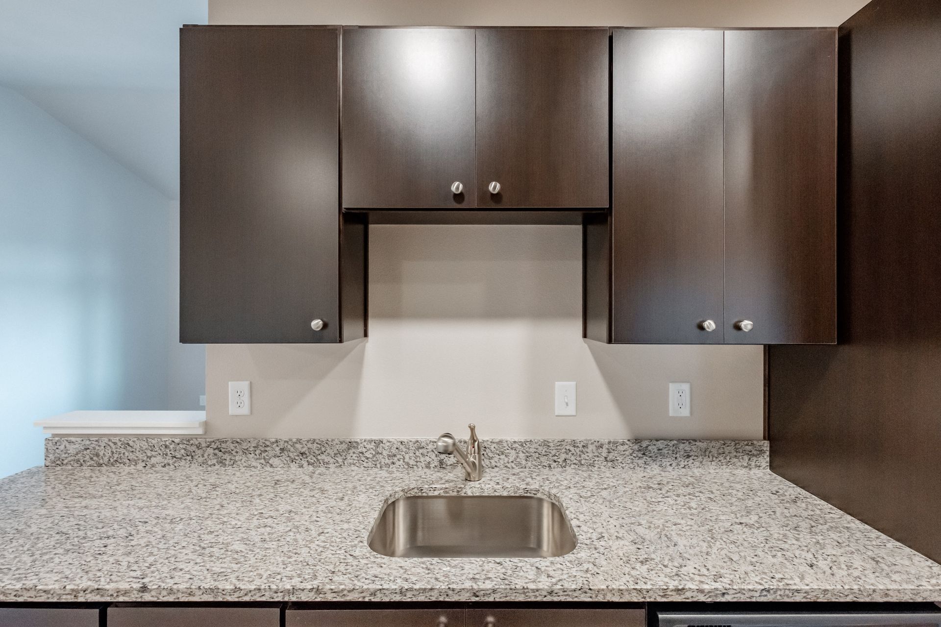 Hickory Hollow Apartments in North Albany OR, three-bedroom two-bathroom –kitchen sink cabinetry. 