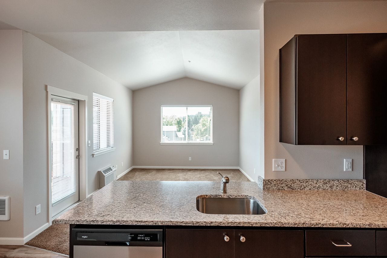 Hickory Hollow Apartments in North Albany OR, two-bedroom two-bathroom – kitchen sink and dining room. 
