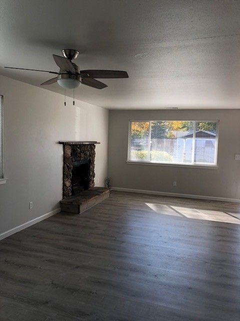 Prairie Place Duplexes in SE Albany OR, two-bedroom, one-bath – living room, fireplace, living room window.
