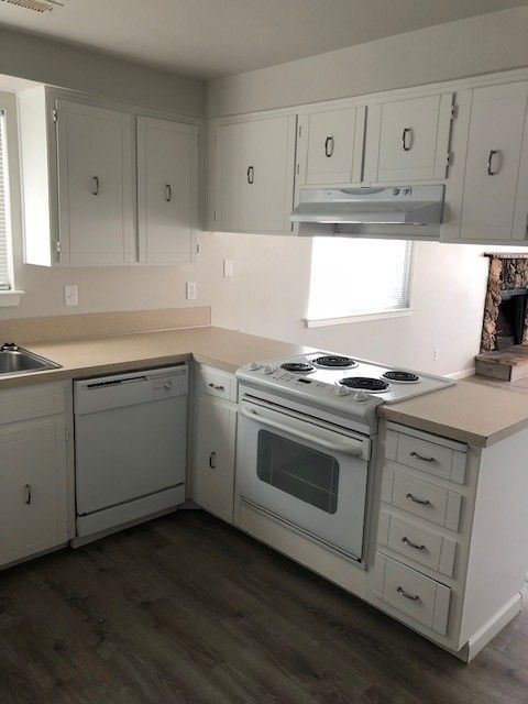 Prairie Place Duplexes in SE Albany OR, two-bedroom, one-bath – kitchen cabinetry, stove, dishwasher.
