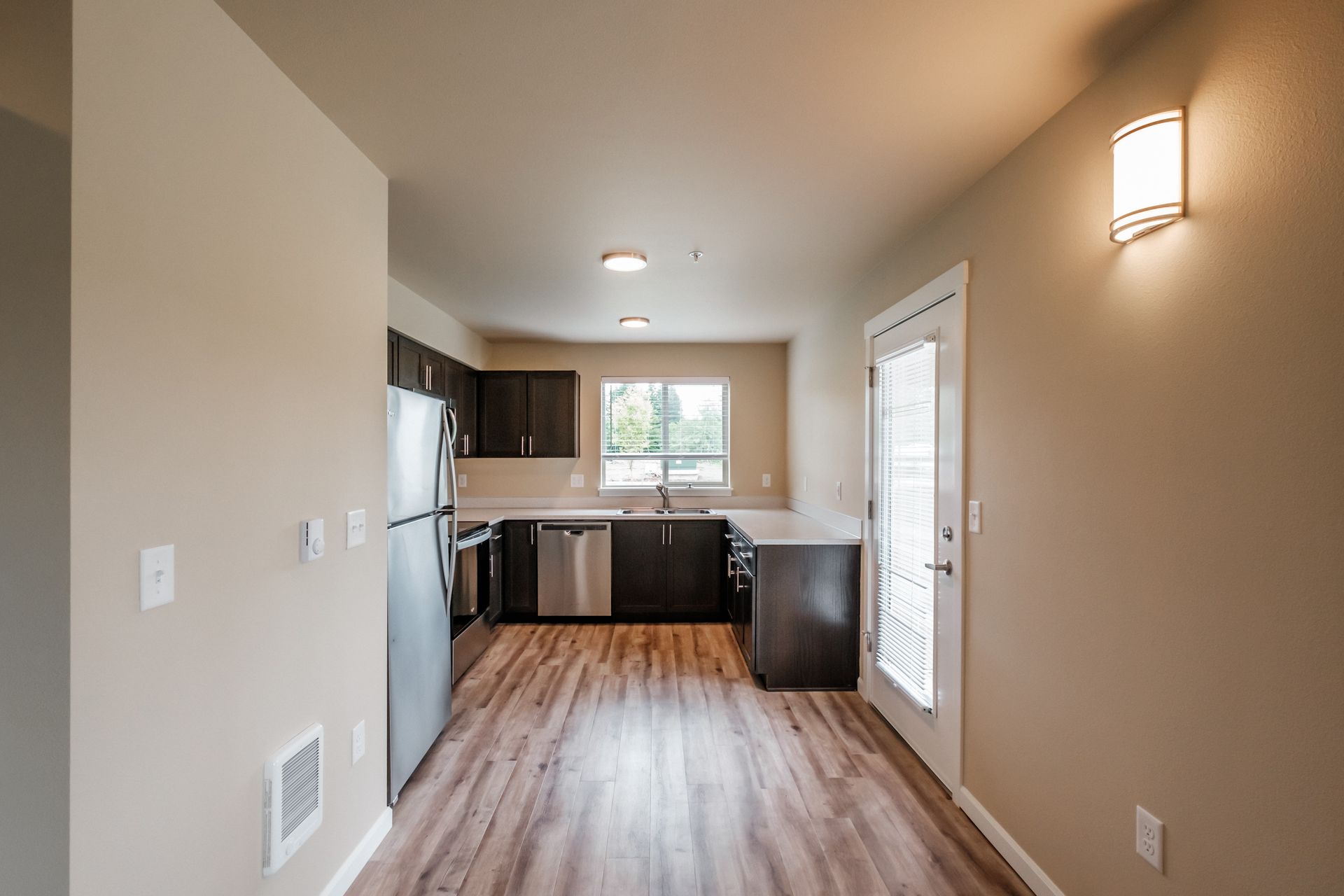 Santiam Gateway Apartments in Sweet Home Oregon, two-bedroom two-bathroom – living room to kitchen.