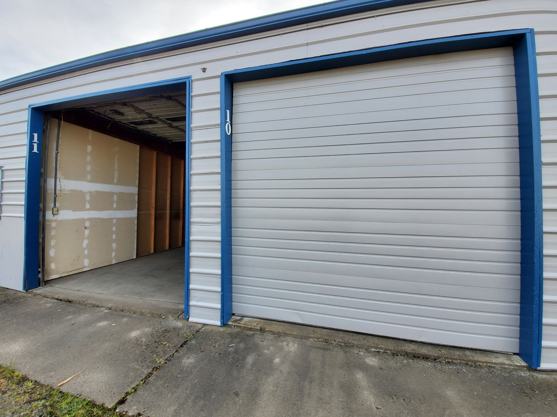 Three Lakes Storage in Albany Oregon – looking into medium storage unit and exterior of another.