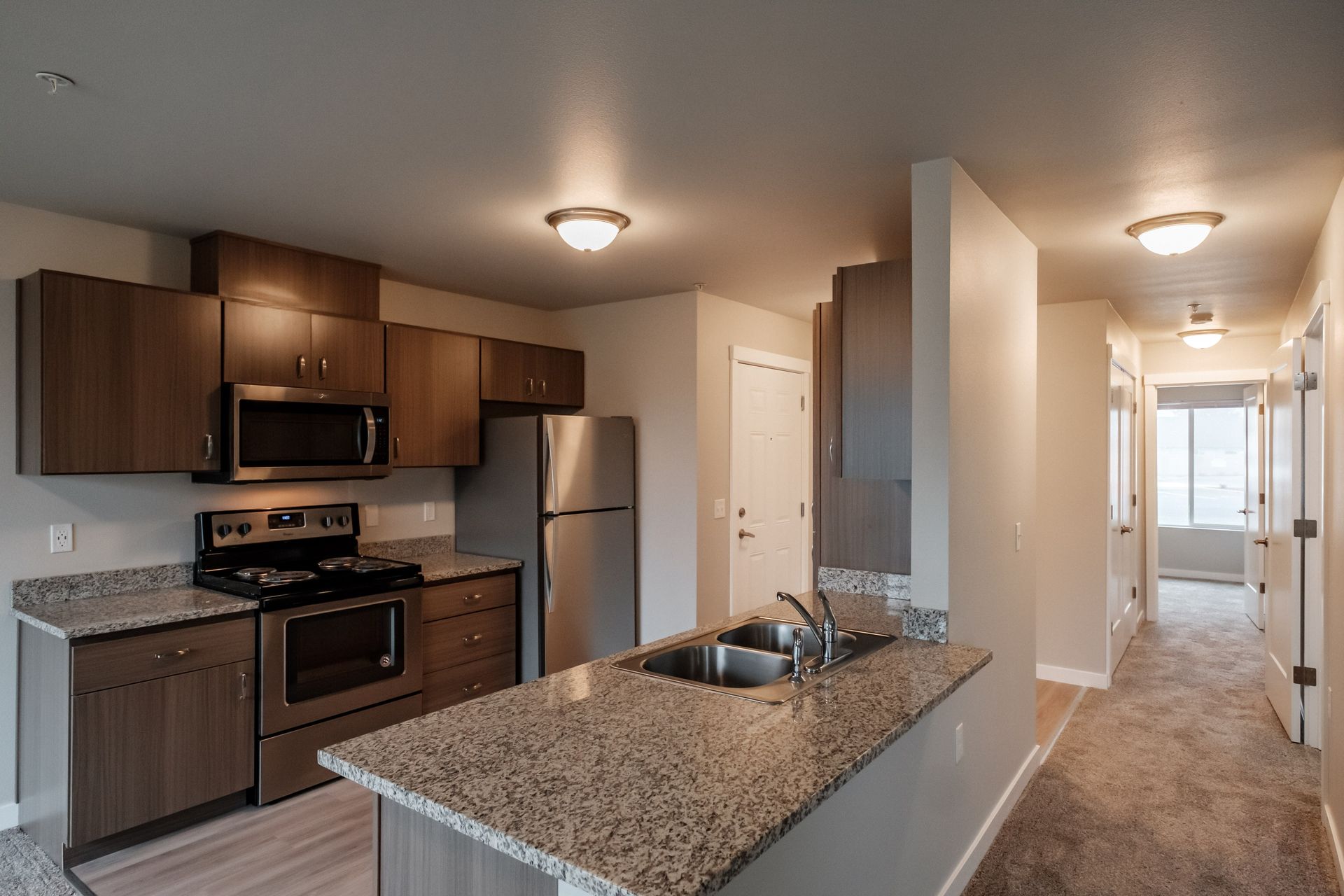 Evergreen Valley Apartments in McMinnville Oregon, near Linfield University, two-bedroom two-bathroom – kitchen refrigerator.