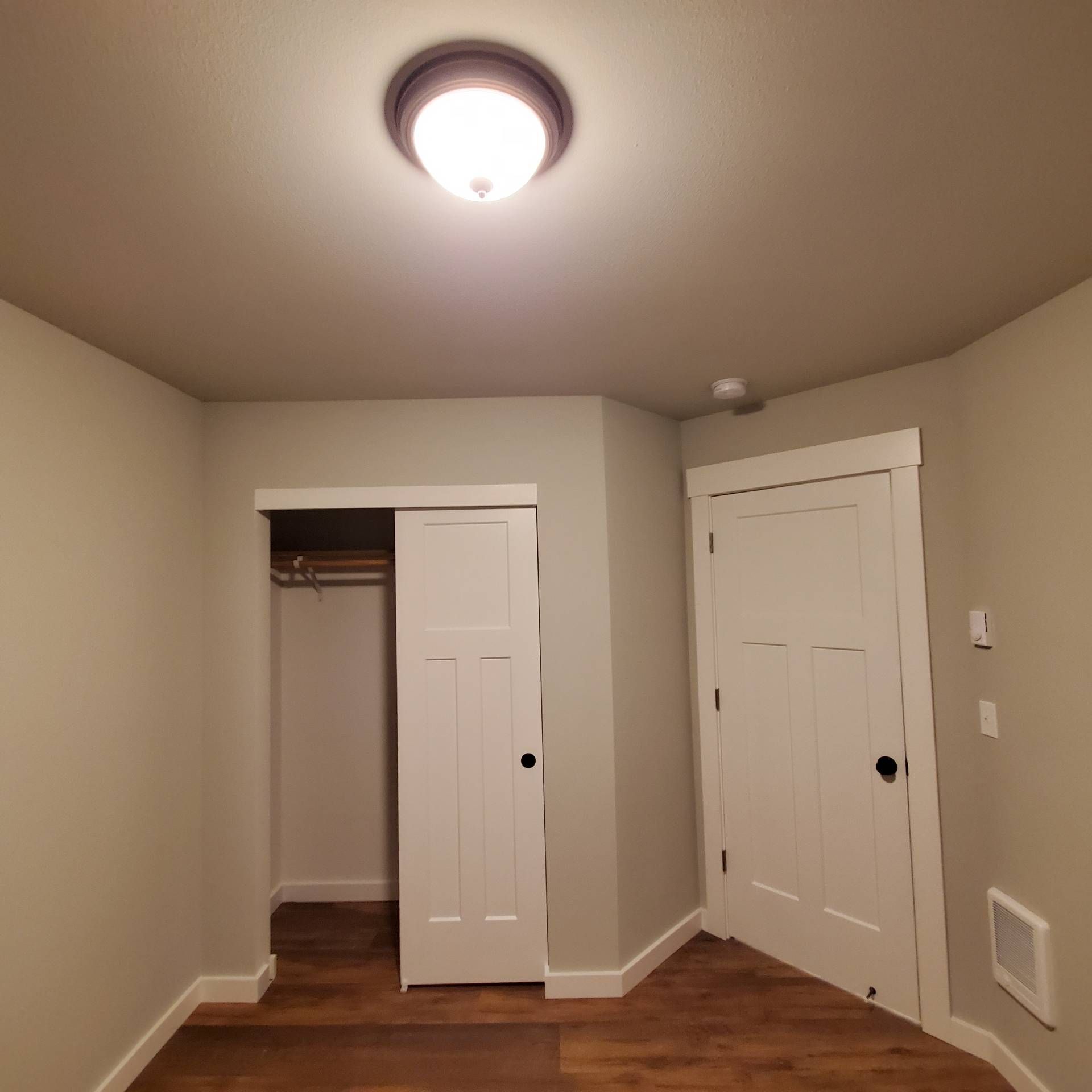 Rye Street Town Homes in Albany, OR. Two Bedroom, Two and 1/2 Bathroom – entryway and coat closet.