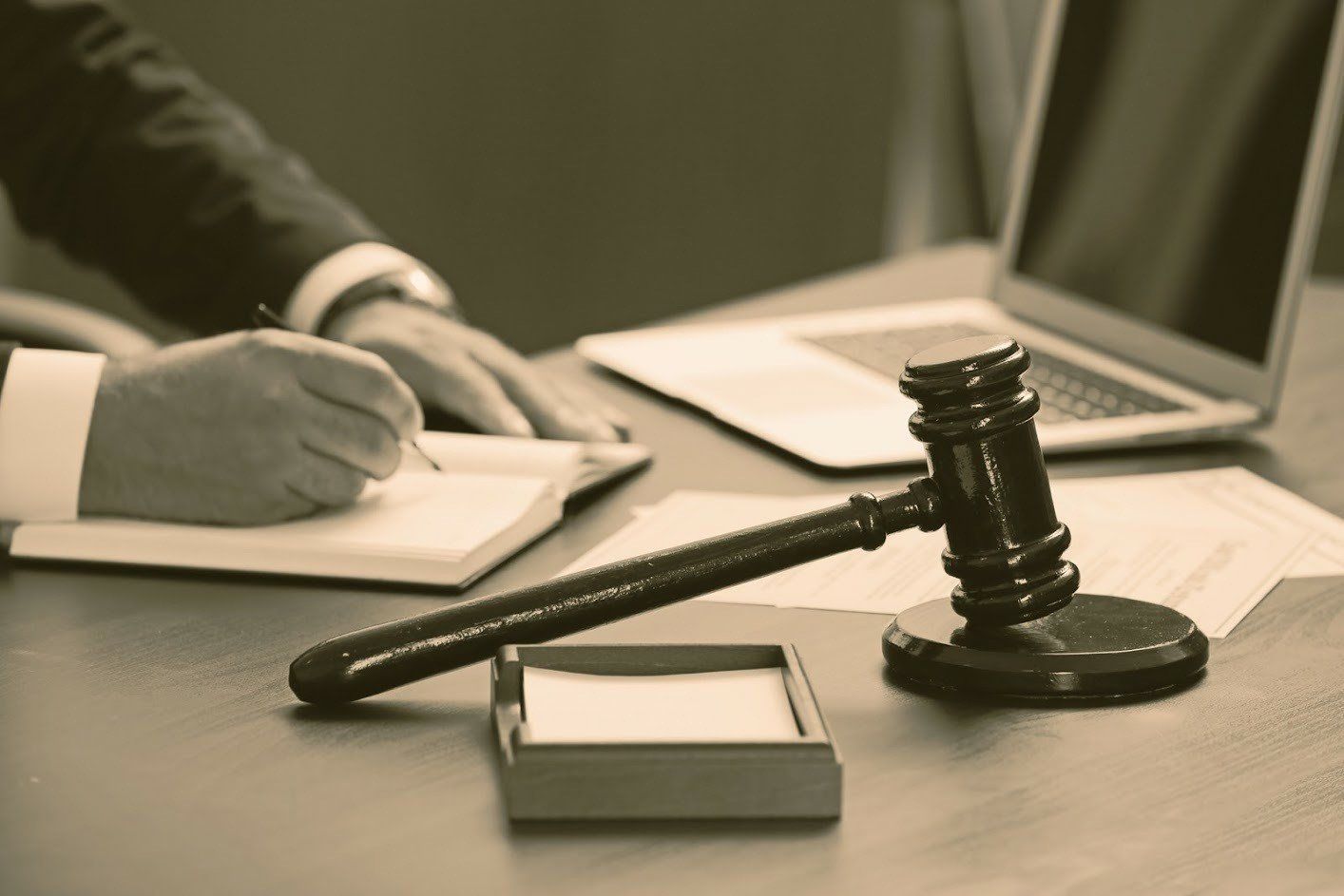 A Lawyer Writing on a Notebook — Hanover, PA — Kalasnik Law Office LLC