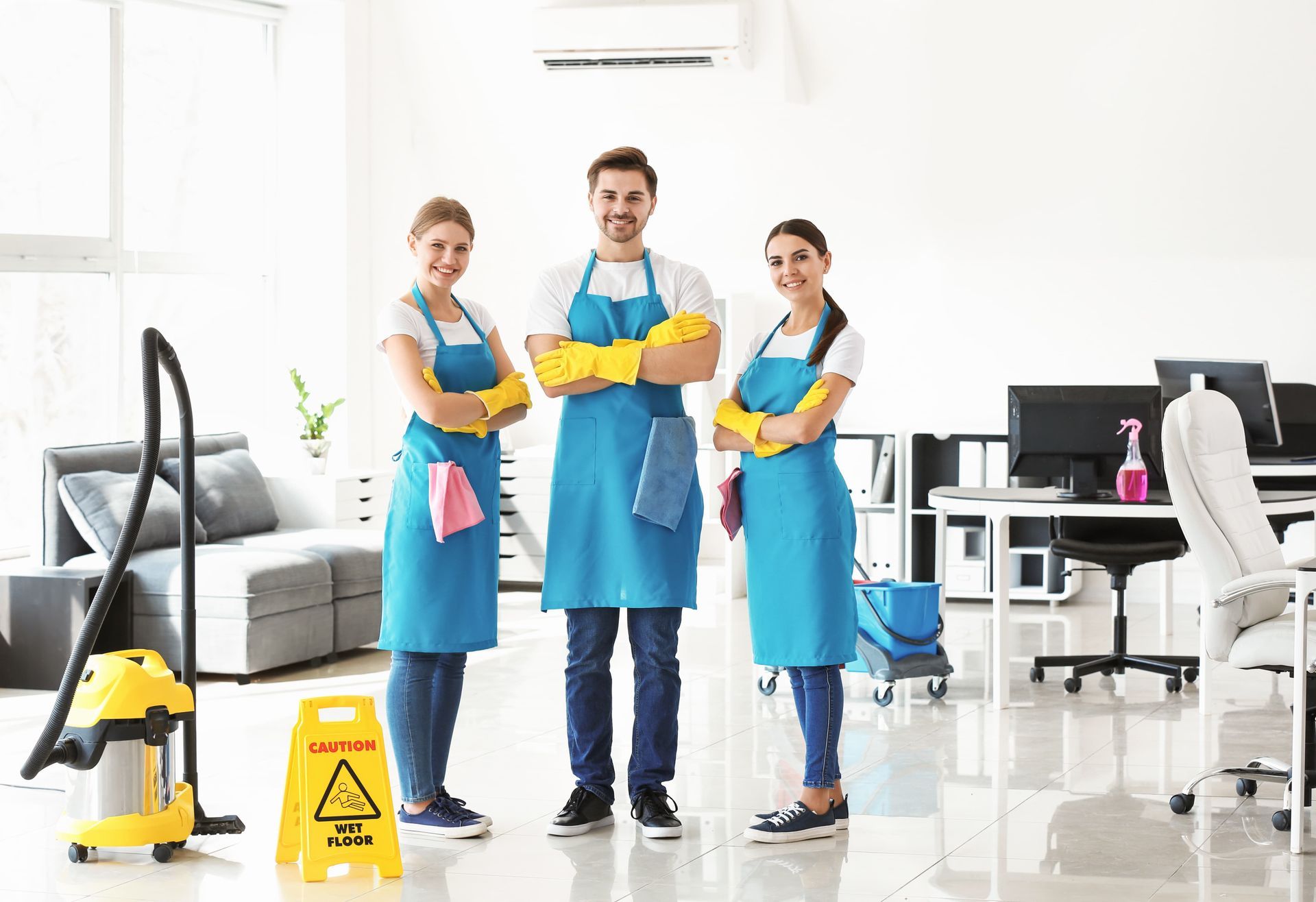 Team Of Janitors In Office