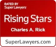 Red Super Lawyers Rising Stars badge with Charles A. Rick and SuperLawyers.com