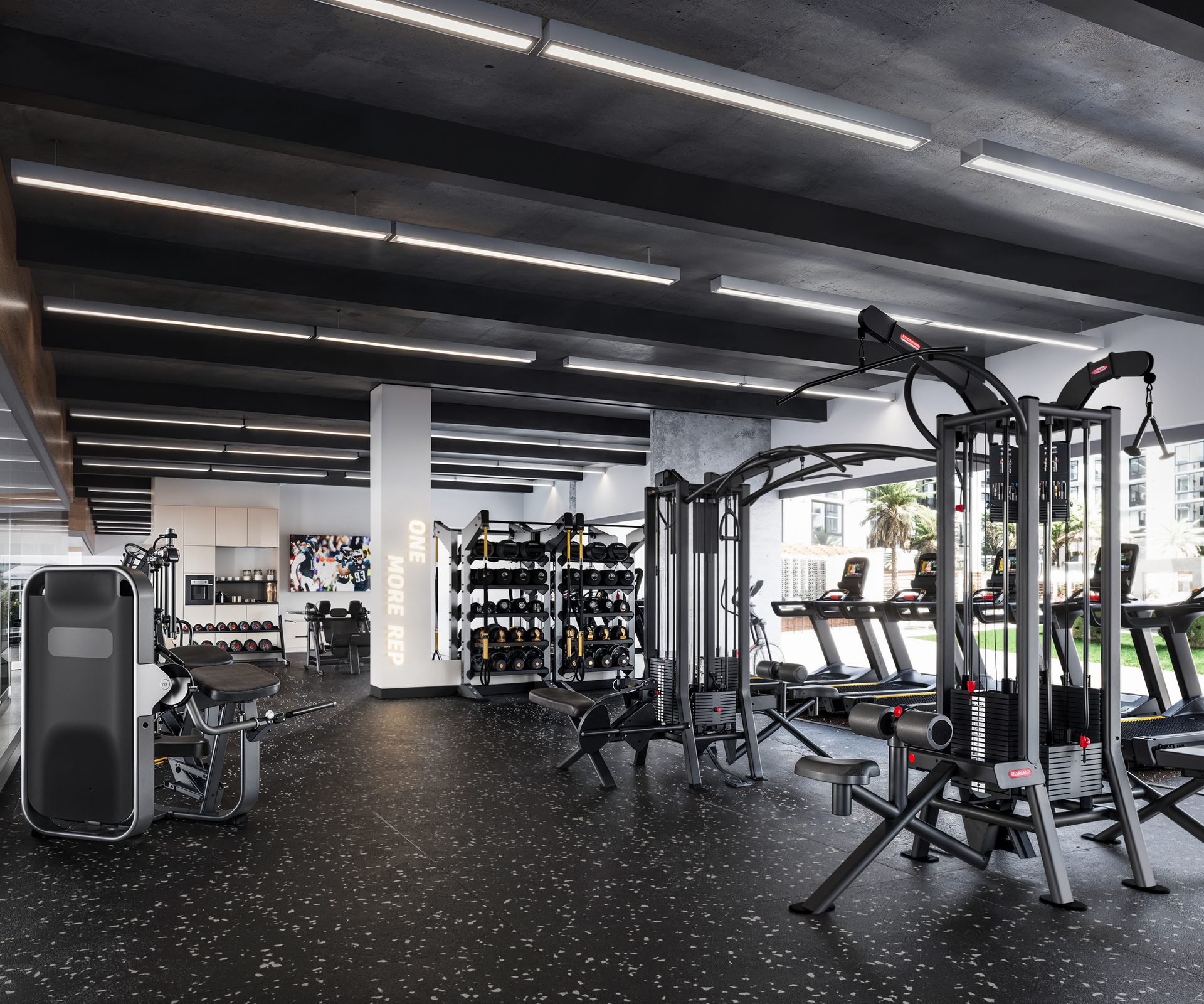 Modern gym interior with weight machines, dumbbells, and cardio equipment under black ceiling beams at The Arcadian in Fort Lauderdale