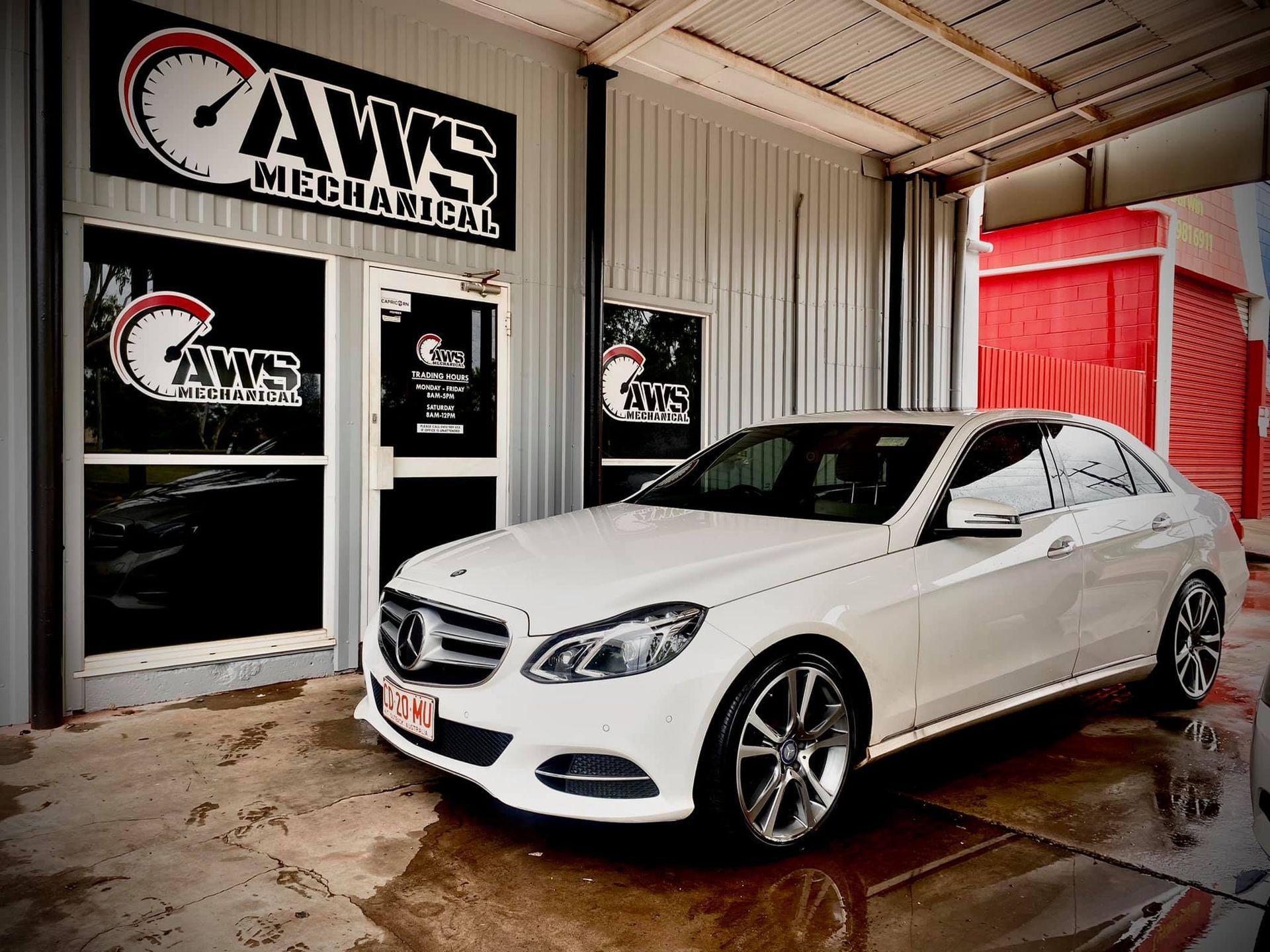 A car waiting outside the Front of a Mechanic — AWS Mechanical in Stuart Park, NT
