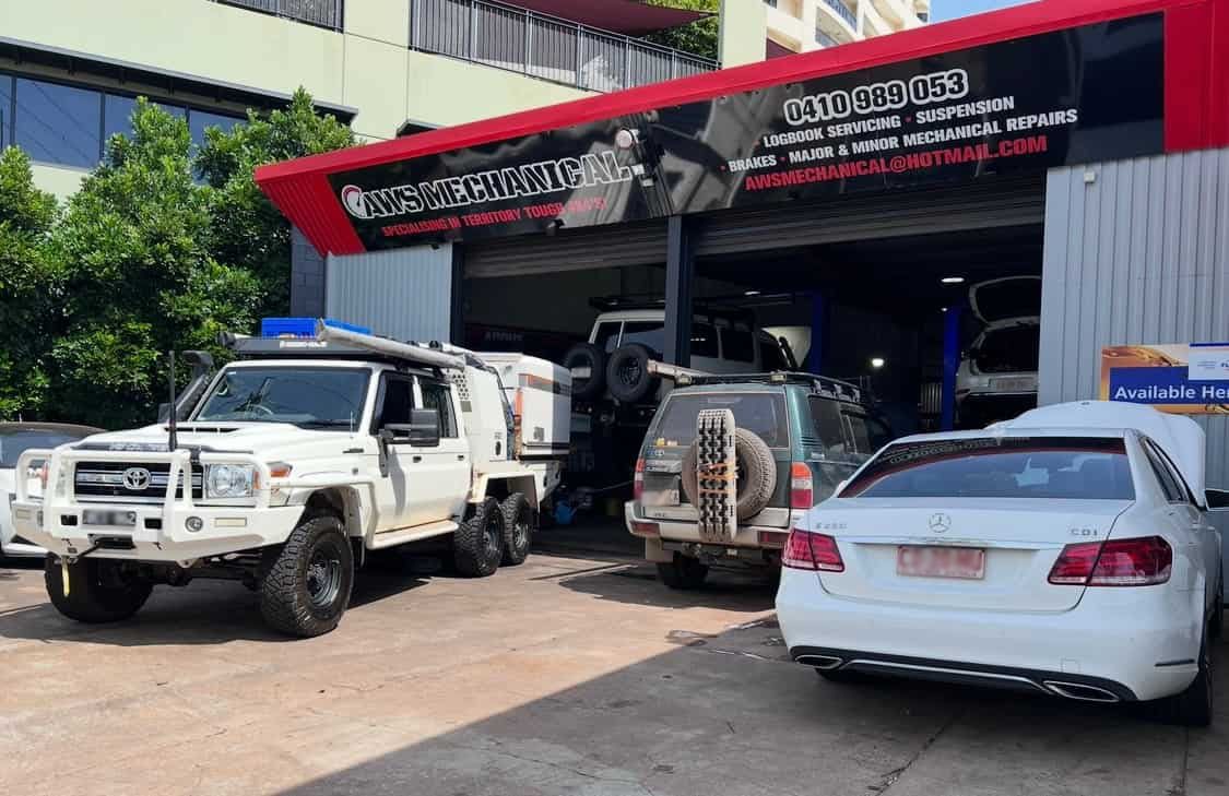 A Group of Cars Are Parked in Front of a Garage — AWS Mechanical in Stuart Park, NT