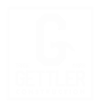 white logo that says gettler construction