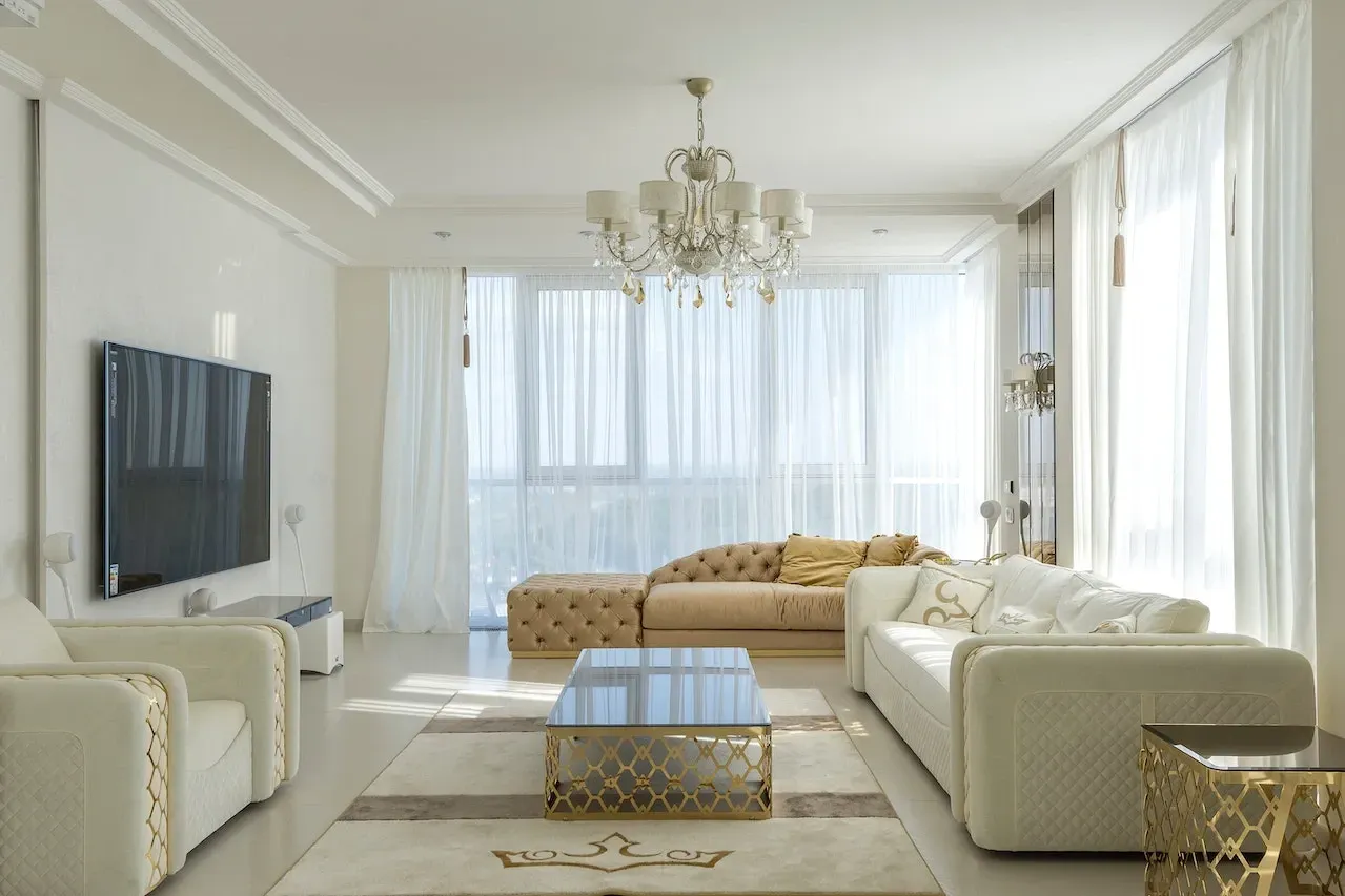 A living room filled with furniture and a flat screen tv.