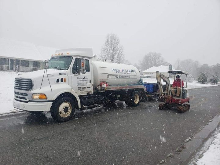 White Truck on the Side of the Road — Monroe, GA — Right Price Plumbing and Septic White Truck on the Side of the Road — Monroe, GA — Right Price Plumbing and Septic