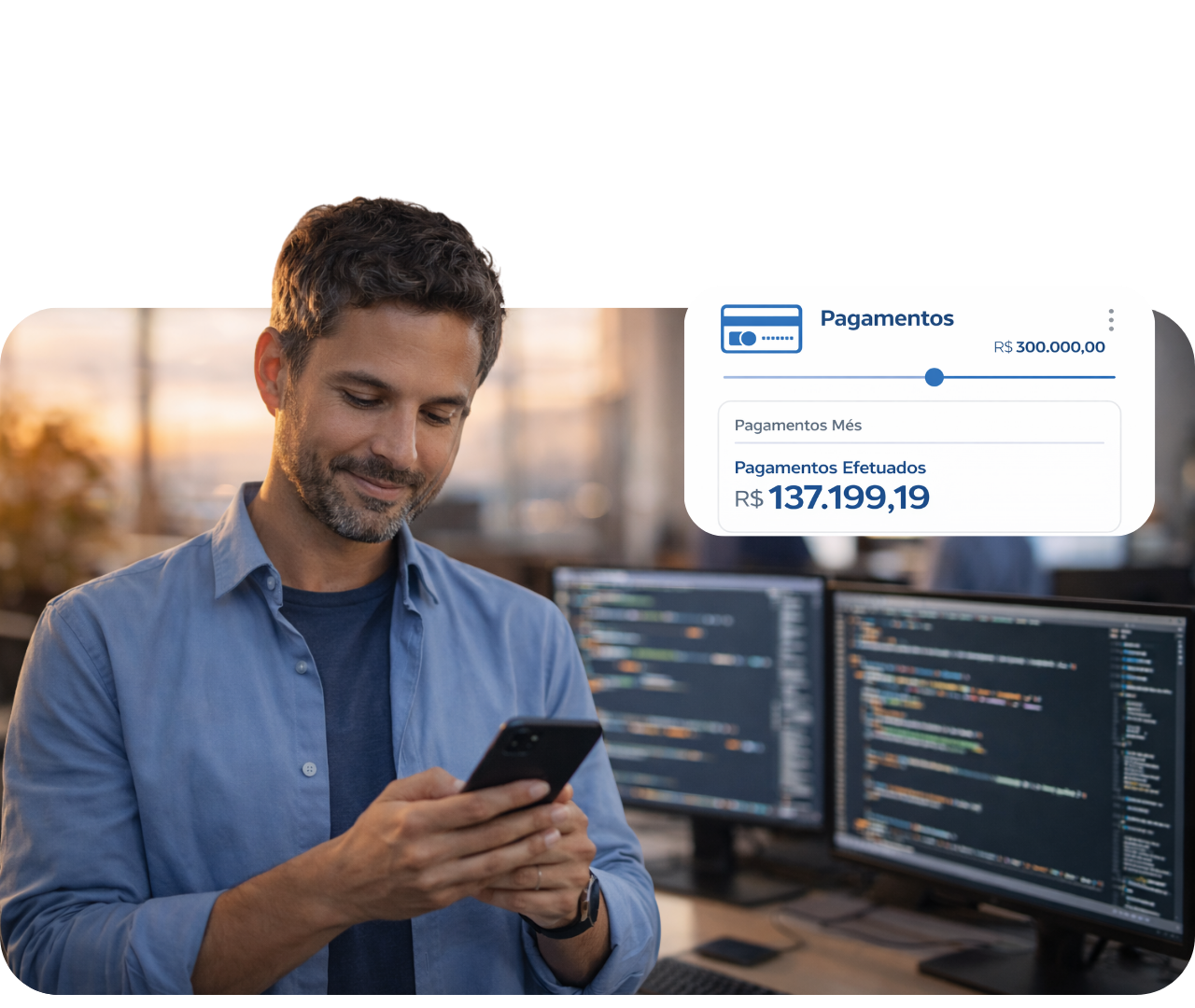 Man smiling at a laptop in a modern office, with code screens and a payment card overlay showing a transfer amount.