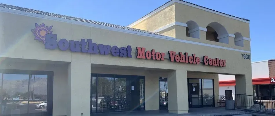 Southwest Motor Vehicle Center building with large signage and glass doors.