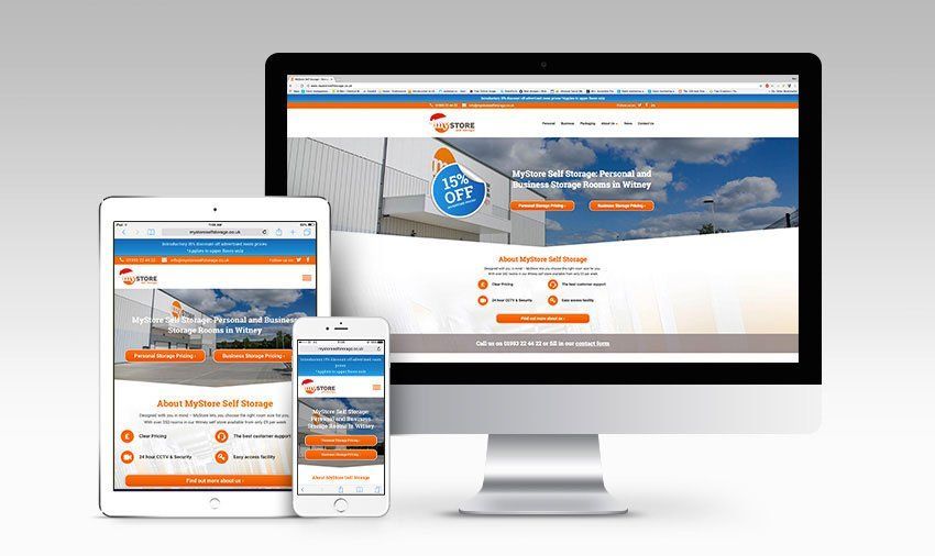 A computer , tablet , and cell phone are displaying a new website.
