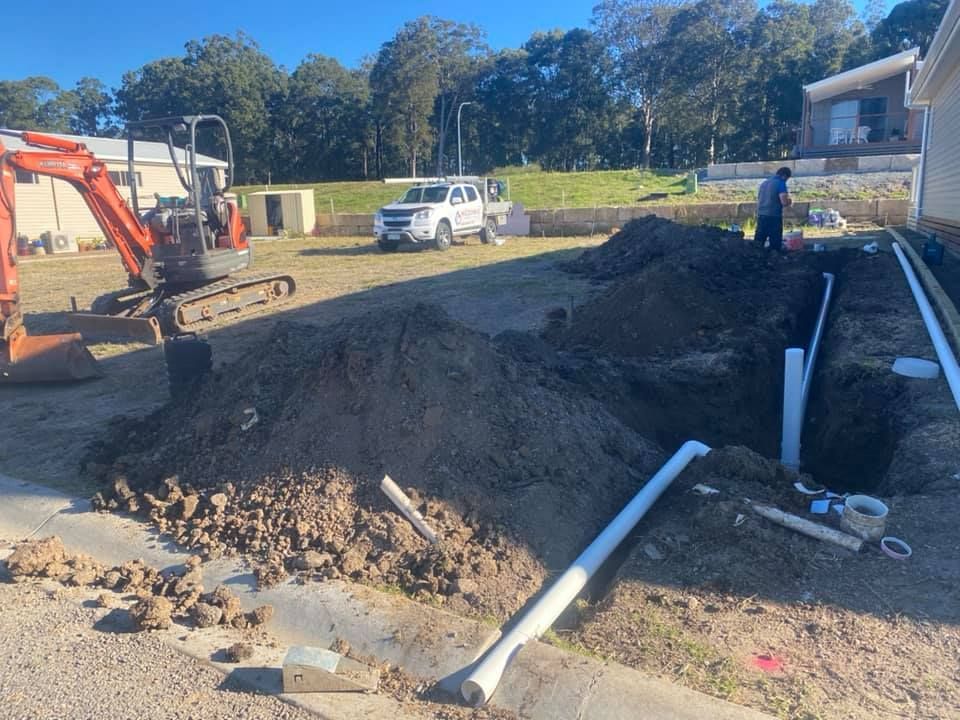 Construction Site with An Excavator — Medowie Plumbing & Gas in in Maitland