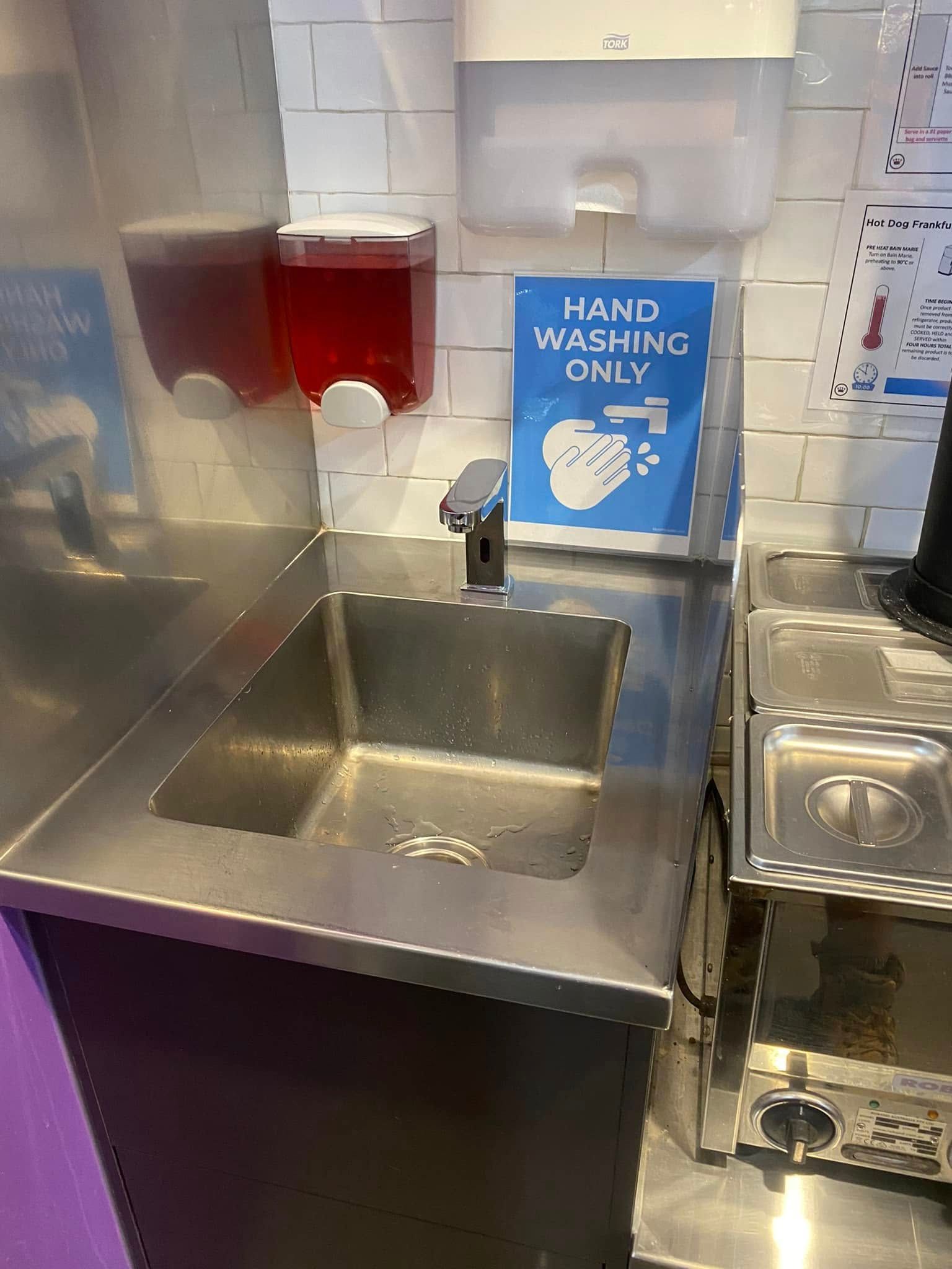 Stainless Steel Sink With Soap Dispenser in a Kitchen Area — Medowie Plumbing & Gas in in Port Stephens