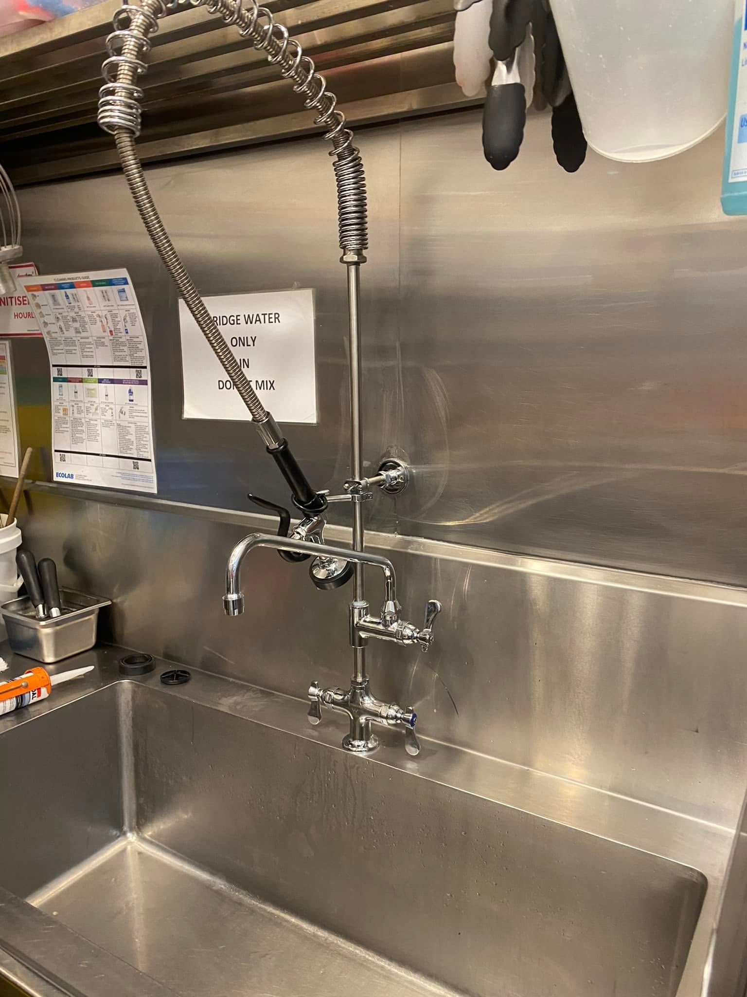 Stainless Steel Commercial Sink With Flexible Pre-rinse Spray Faucet — Medowie Plumbing & Gas in in Maitland