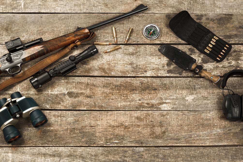 A Rifle, Binoculars, and Various Hunting Gear — Coffs Coast Firearms In Casino, NSW