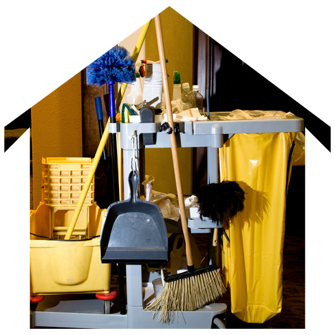 A house with a cleaning cart and cleaning supplies on it