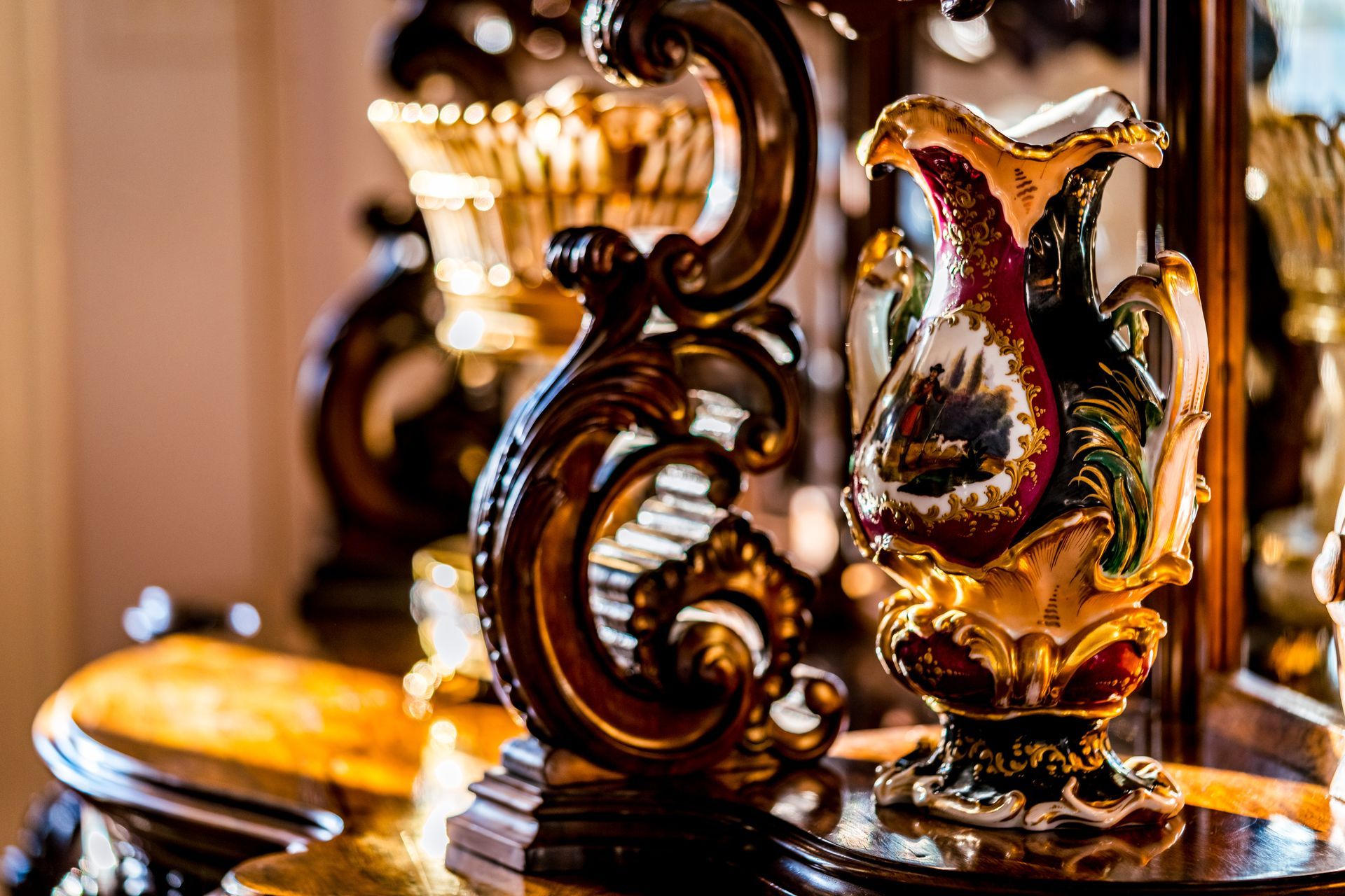 A vase is sitting on top of a wooden table.
