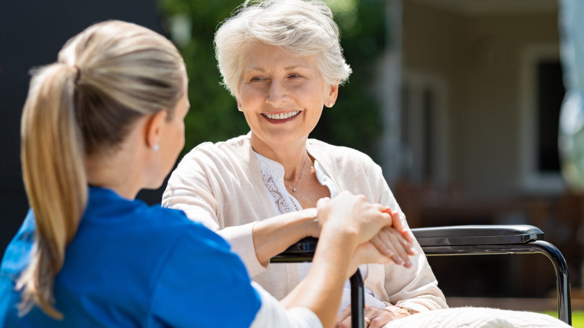 senior living facility with elderly woman and nurse