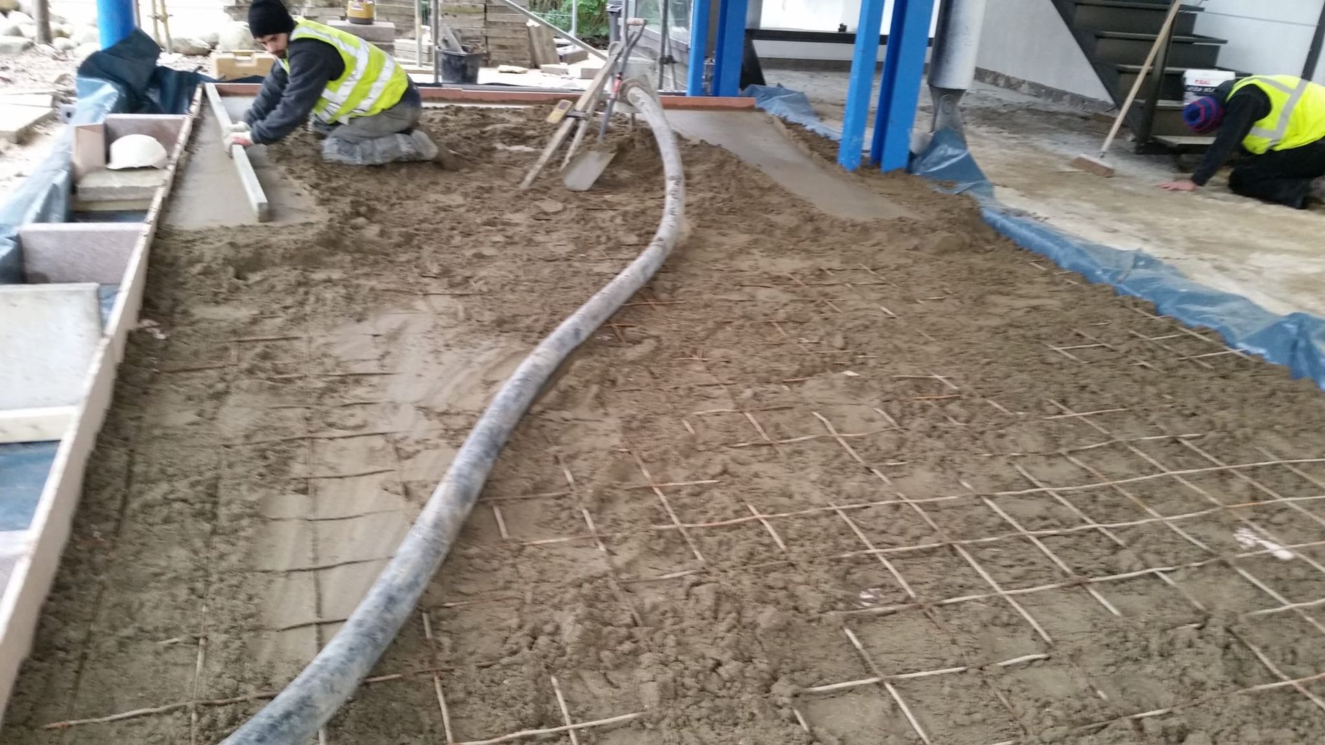 Floor screed being laid on a building site in London