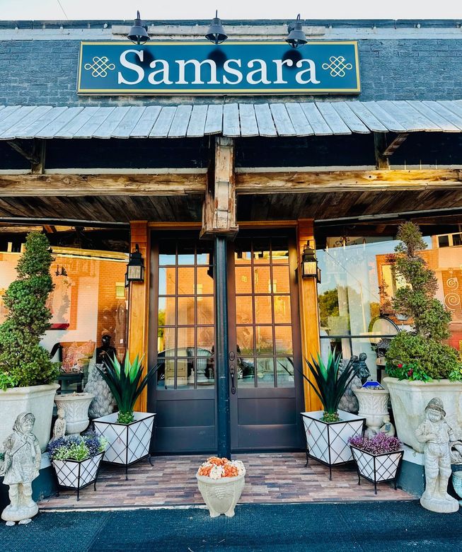 A store front with a sign that says samsara