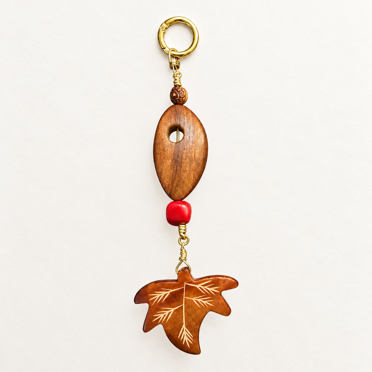 Wooden Leaf Bag Charm: Add a touch of nature to your accessories. Perfect for enhancing your bag while showcasing your unique style!