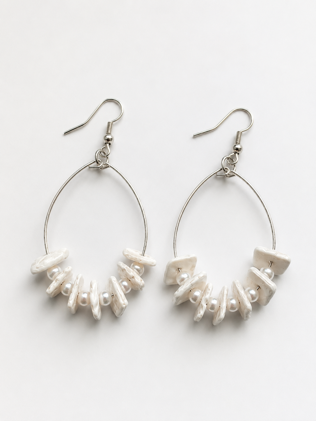 Small Puka Shell Hoop Earrings (Image displayed on Model Appear Larger)