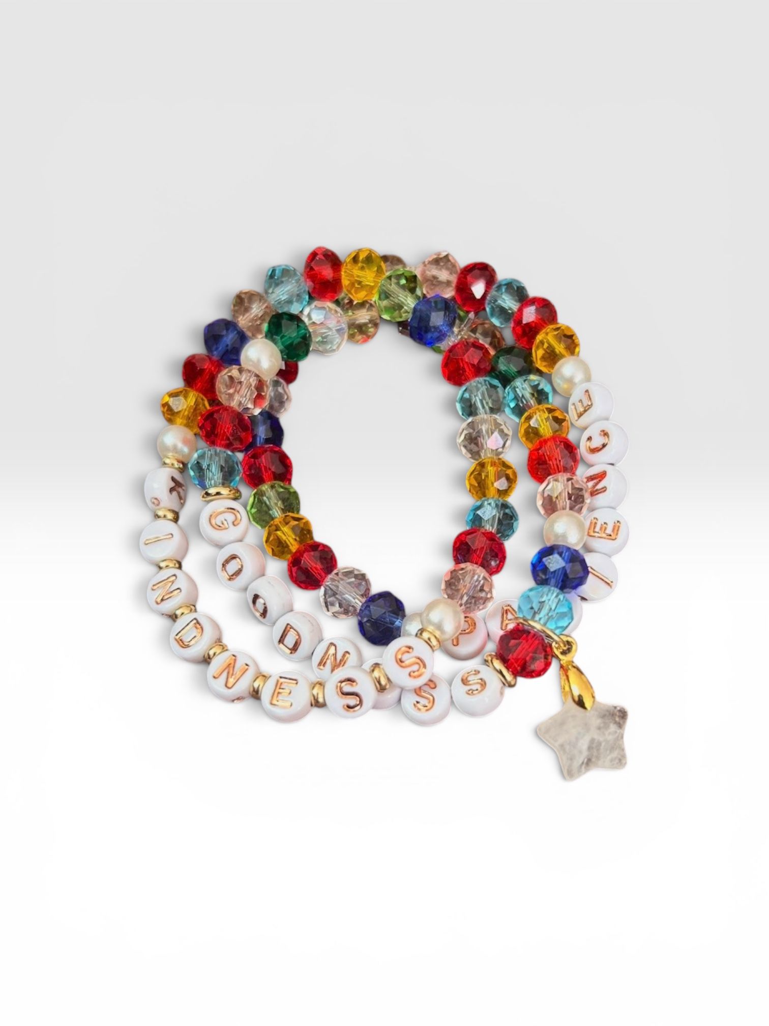Colorful beaded necklace with white letter beads and a small star pendant on a white background