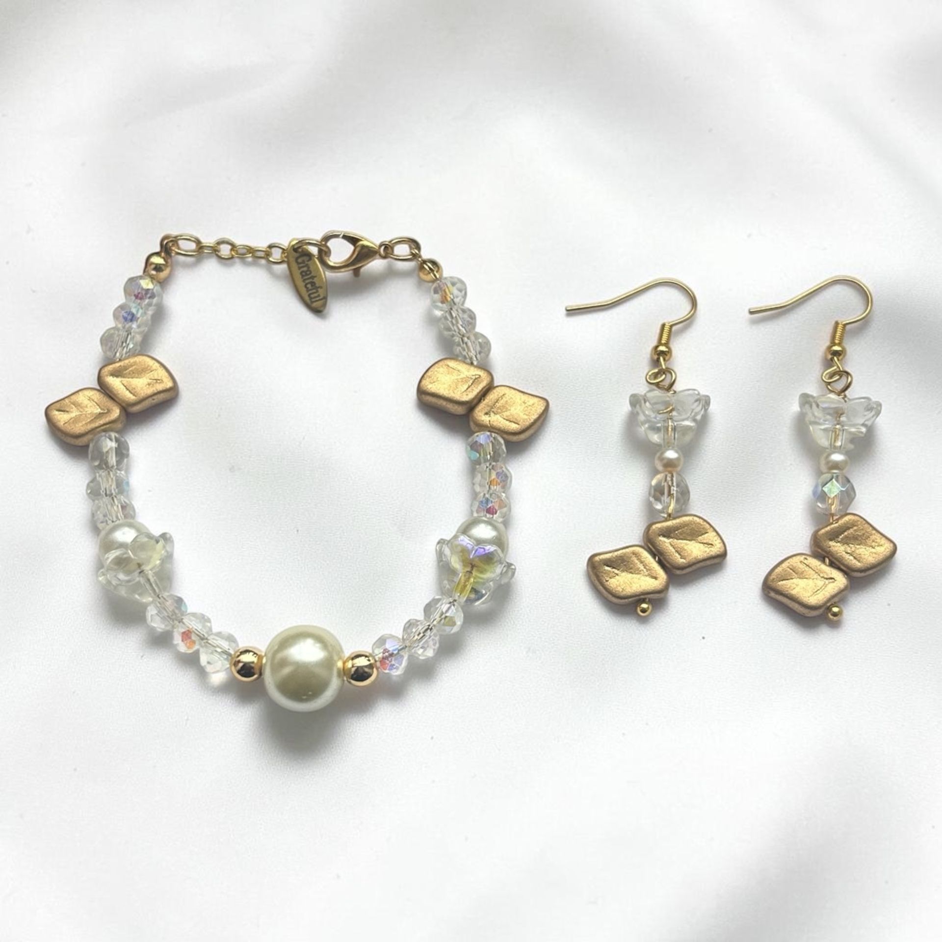 Elegant Crystal Beaded Bracelet and Mother of Pearl Accompanied by Earrings