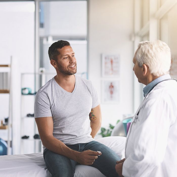 Doctor Giving His Male Patient A Thorough Checkup - Kissimmee, FL - Dr. Mohammed B. Answer, MD