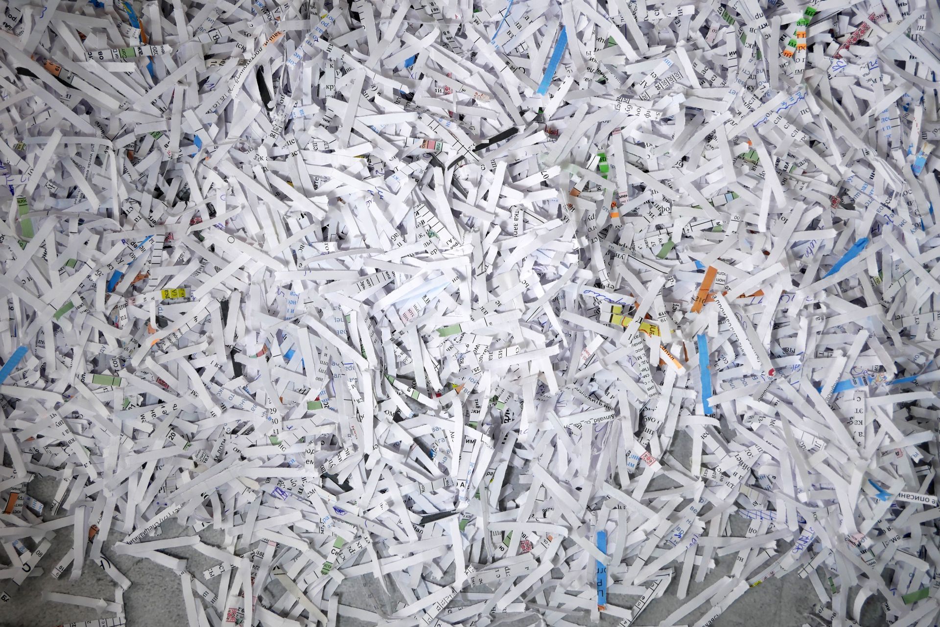 A pile of shredded paper is sitting on a table.
